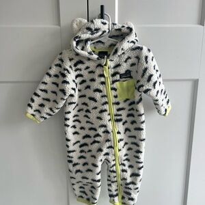 Patagonia Fuzzy White and Black snow leopard lime green Kids Footie bunting
